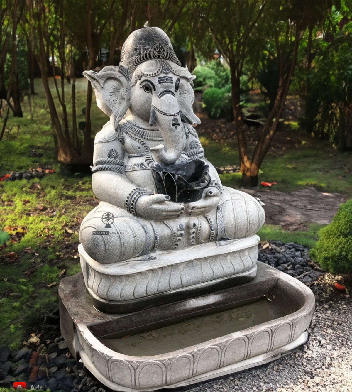 Ganesha Statue With Cascading Water