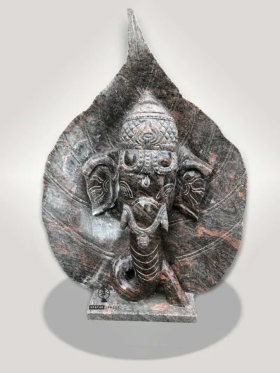 Lord Ganesha With Leaf Decorative Stone Sculpture