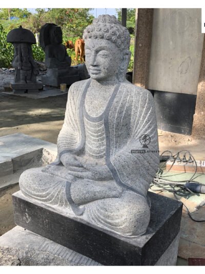 calm face Buddha stone statue