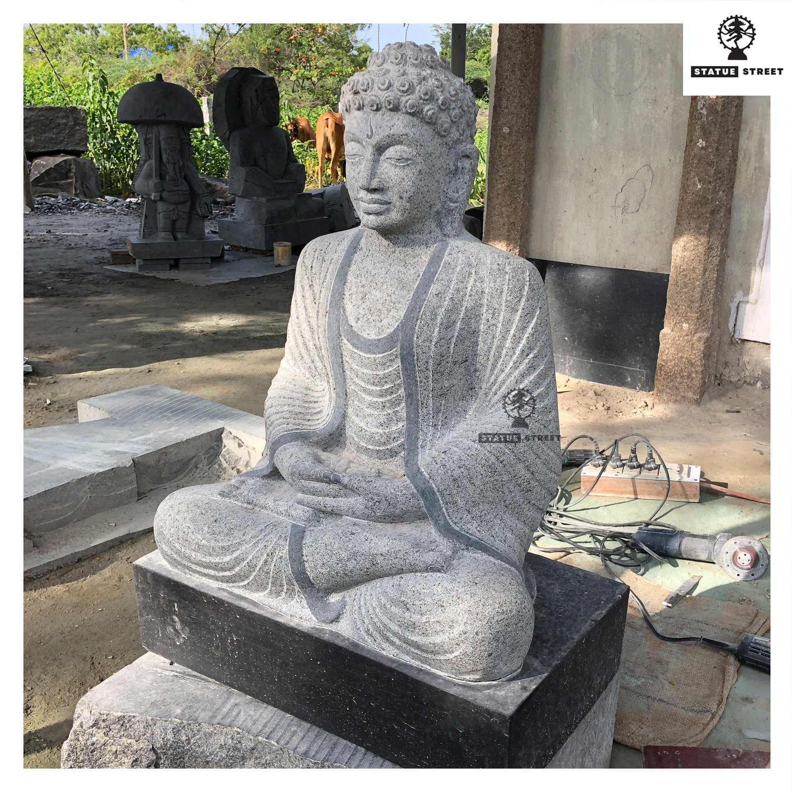 calm face Buddha stone statue