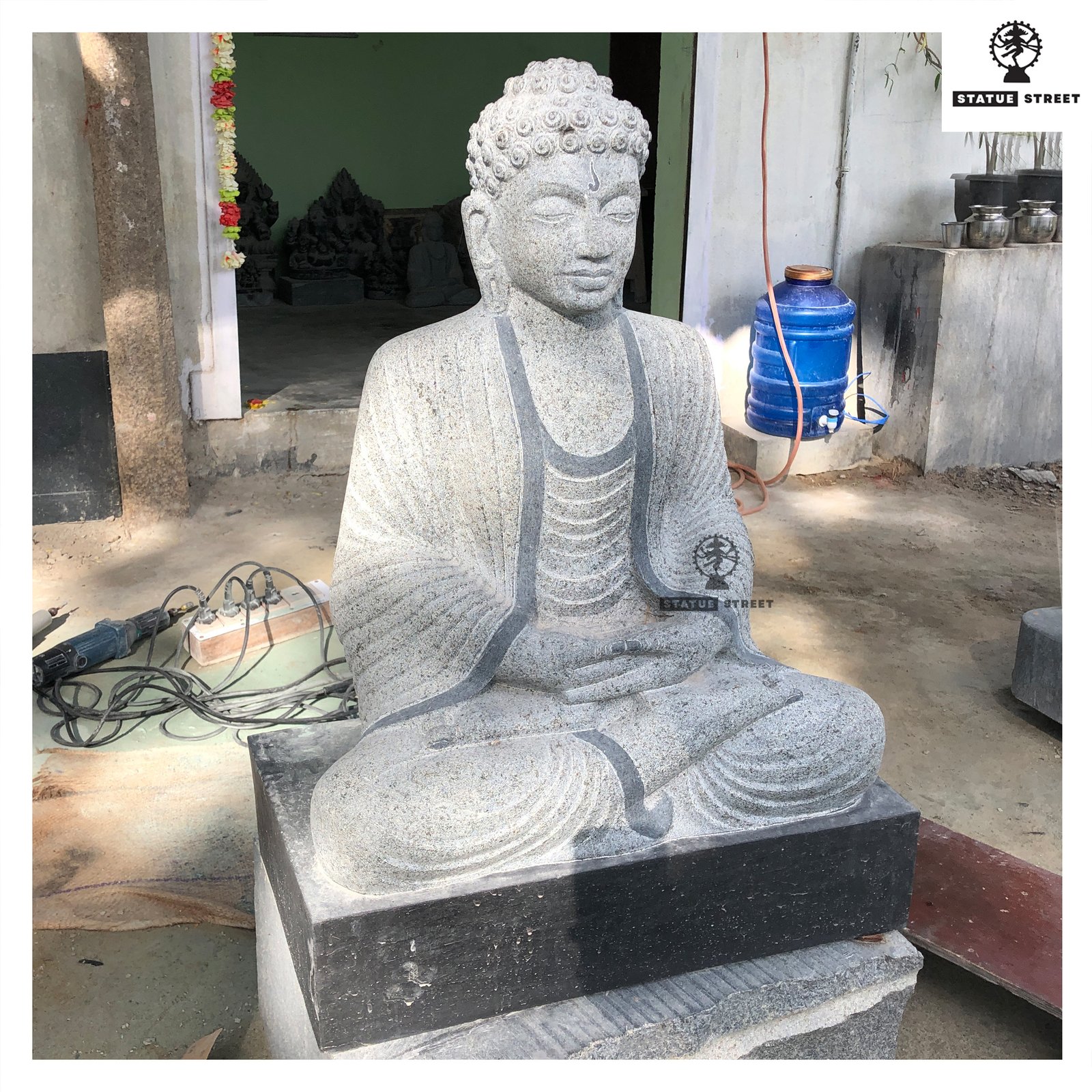 calm face Buddha stone statue